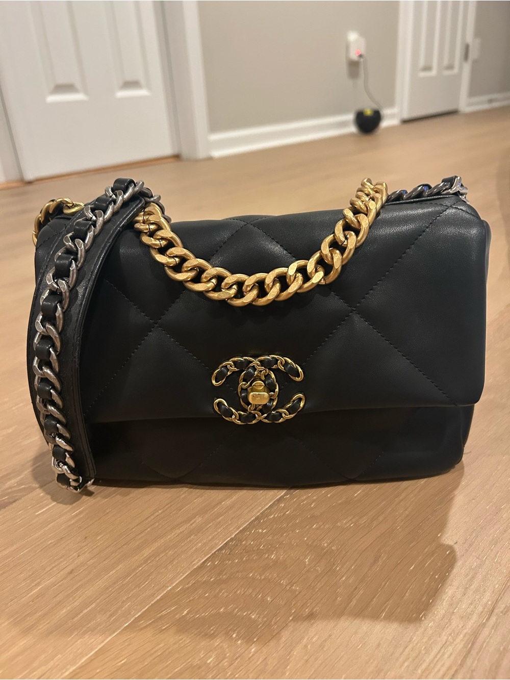 CHANEL Black Quilted Leather Crossbody with Gold & Silver Chain